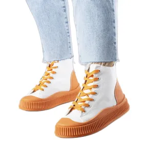 Orange platform sneakers from Terri white