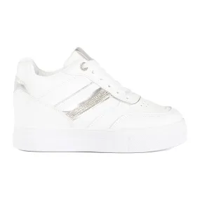 White sneakers with a hidden wedge