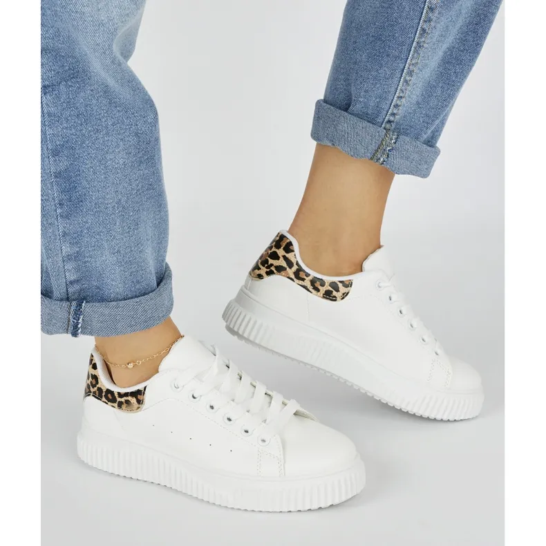 White women's sneakers with a leopard print element